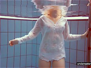 cute ginger-haired plays naked underwater