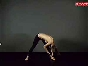 brown-haired gymnast demonstrating of her ass
