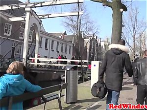 Amsterdam escort deep-throats customer