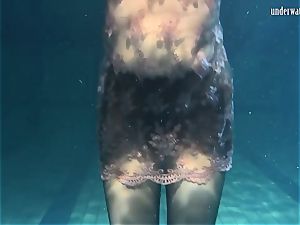 Lozhkova in see through cut-offs in the pool