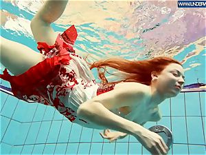 super-hot grind red-haired swimming in the pool
