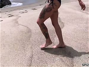 Anna Bell Peaks smashing a big jizz-shotgun on the beach